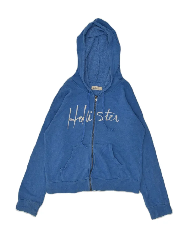 HOLLISTER Womens Graphic Zip Hoodie Sweater UK 8 Small Blue Cotton Denim Fabric Leather Fabric Suede Fabric HOLLISTER Womens Graphic Zip Hoodie Sweater UK 8 Small Blue Cotton Denim Fabric Leather Fabric Suede Fabric
