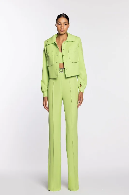 Bright green crop top paired with pants and bolero