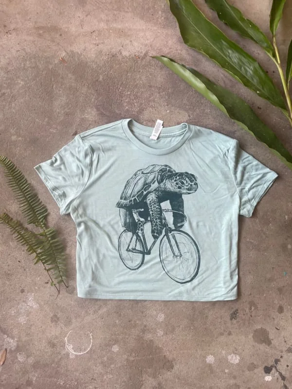 Sea turtle on a Bicycle Women's Crop Top Fashionable Trendy Casual